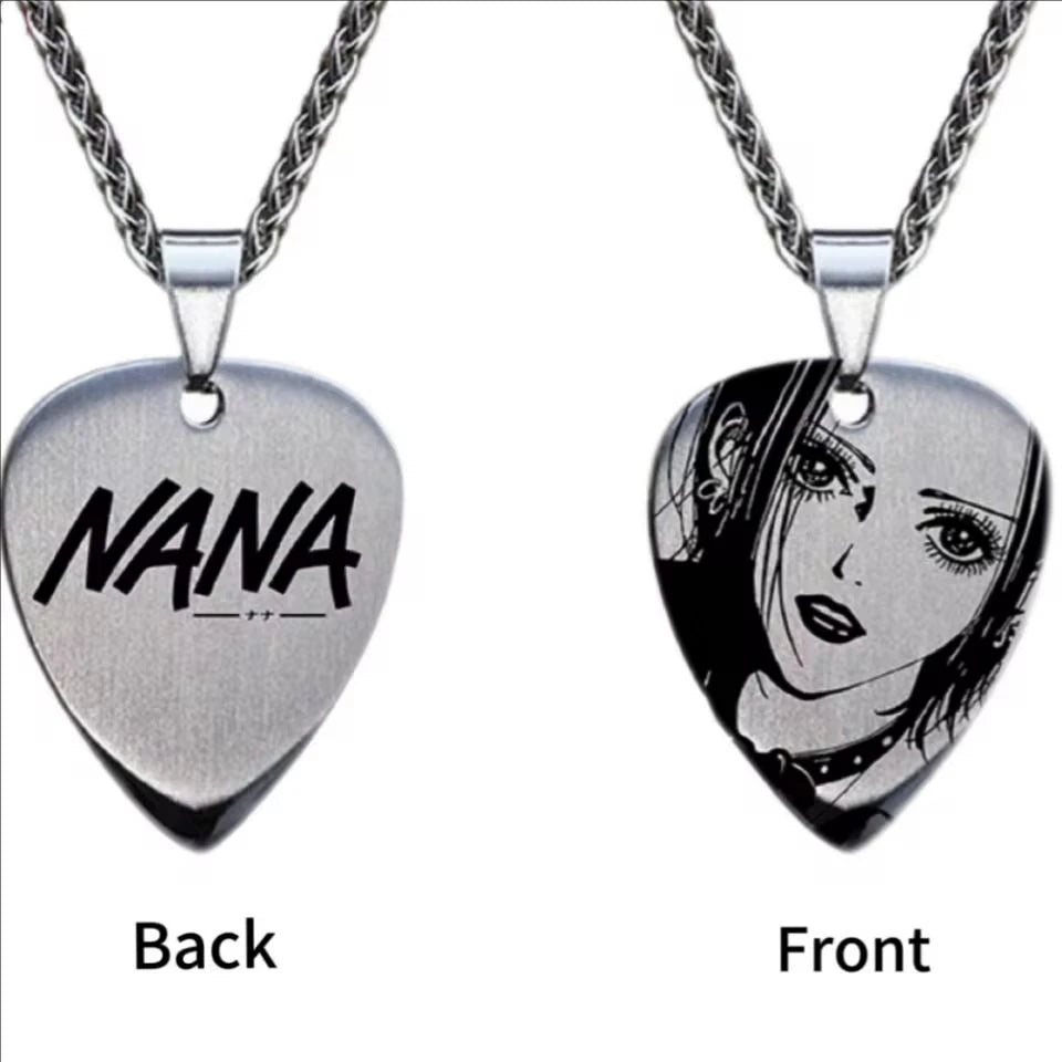 Heart-shaped pendant with 'Nana' on one side and a face design on the other, shown from front and back.